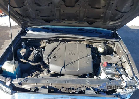 2015 Toyota Tacoma Base V6 z USA, uszkodzony, nr VIN 3TMLU4EN2FM192007